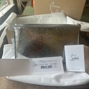 Christian Louboutin Loubila clutch bag. New with tags and box. Silver.